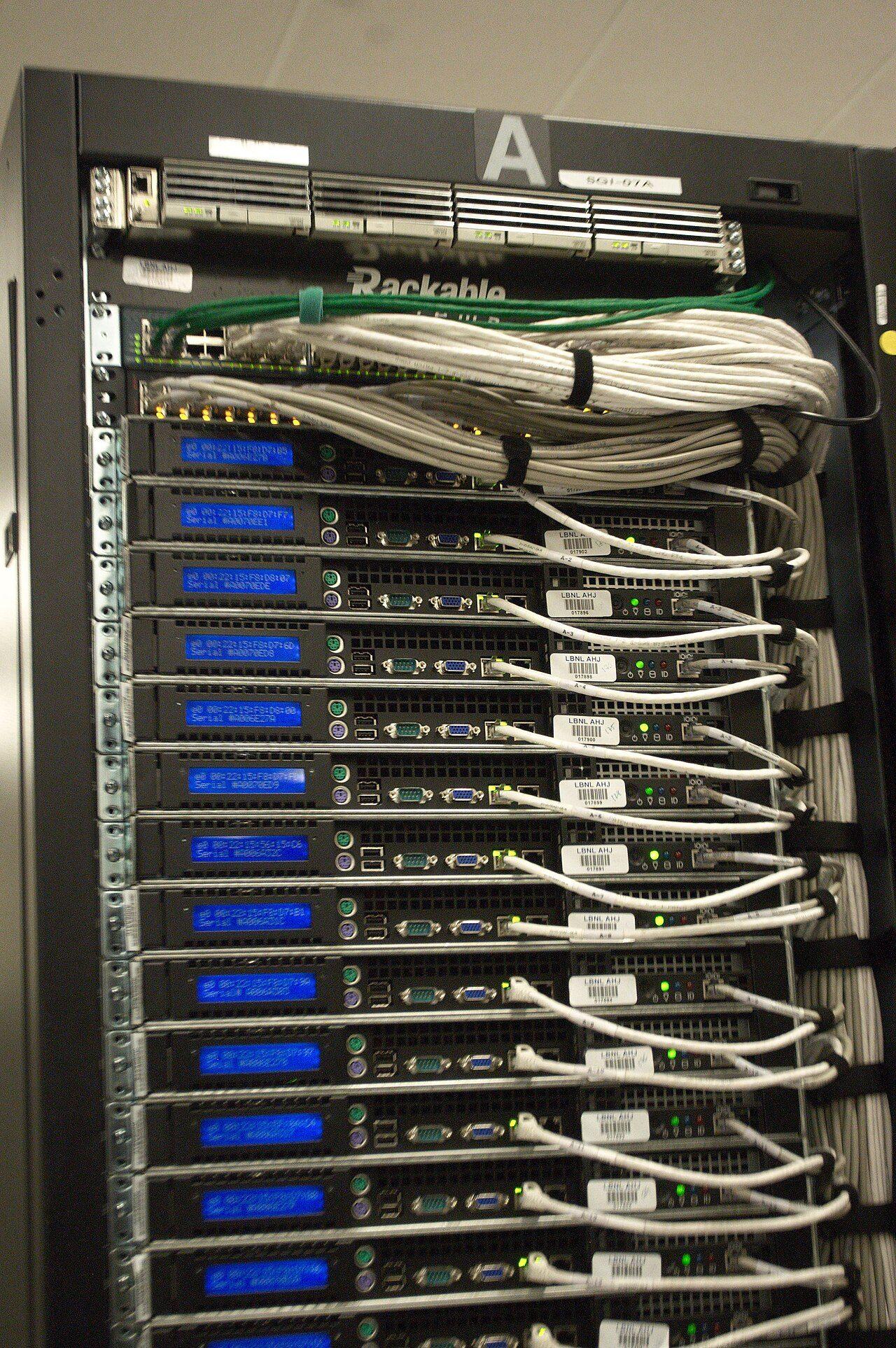 The rear of a networked server rack with cabling