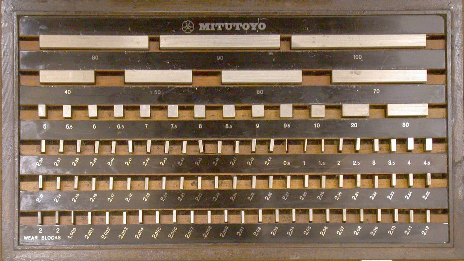 A set of precision gauge blocks in a case
